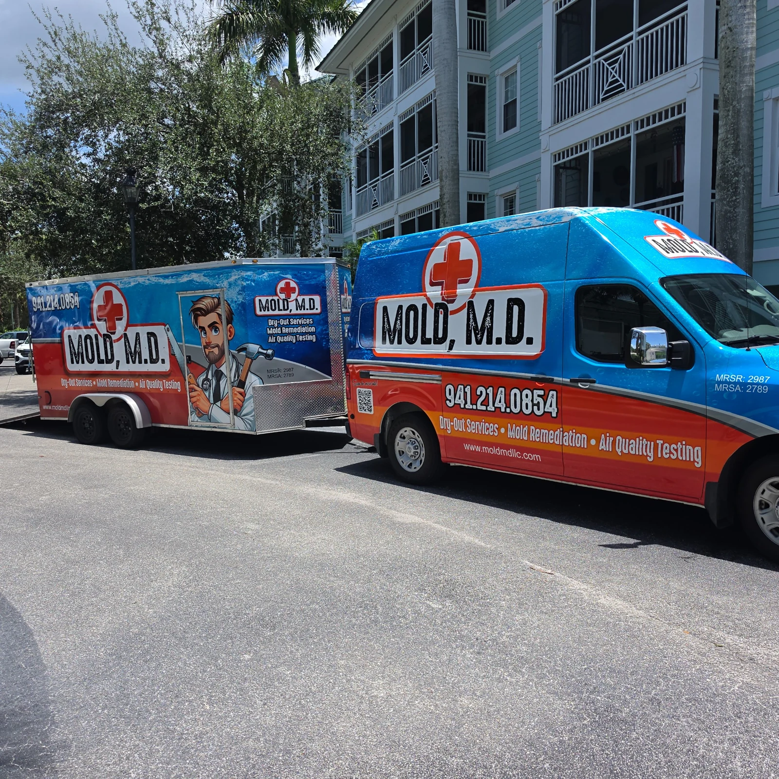 Mold, M.D. branded service van and trailer at a Florida property